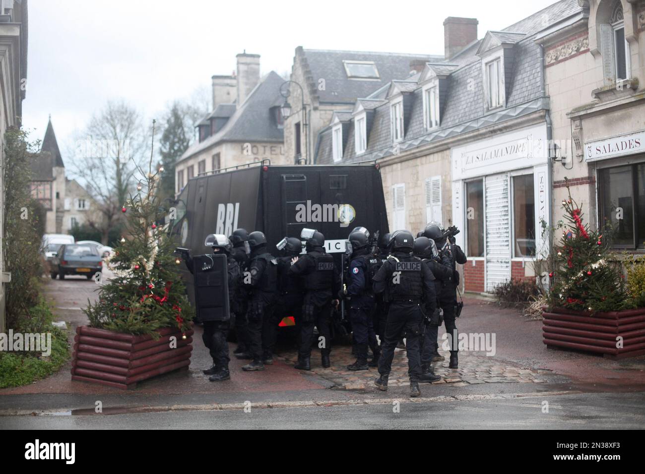 French riot officers patrol in Longpont, north of Paris, France ...