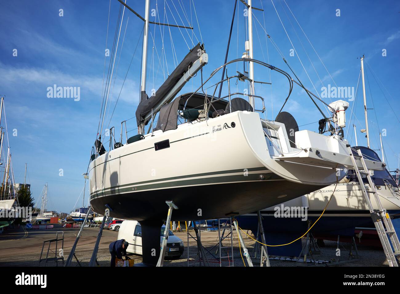 Cabin cruiser on dry land in a boat yard at Ipswich marina, Suffolk, UK