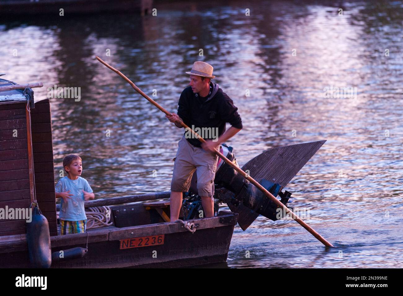 France, Loiret (45), Orléans, Loire Festival 2019, toue cabanée at sunset, traditional boat maneuvered with a blunder Stock Photo