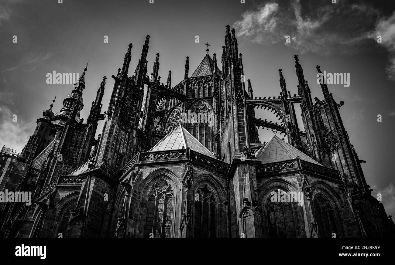 A grayscale shot of St. Vitus Cathedral in Prague, Czechia Stock Photo