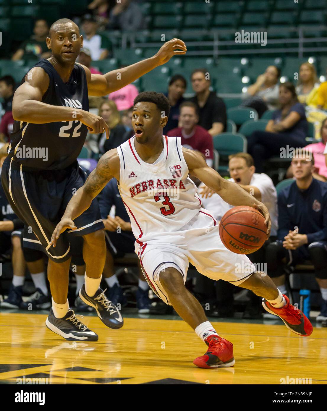 Nebraska guard Benny Parker (3) darts past Loyola Marymount forward