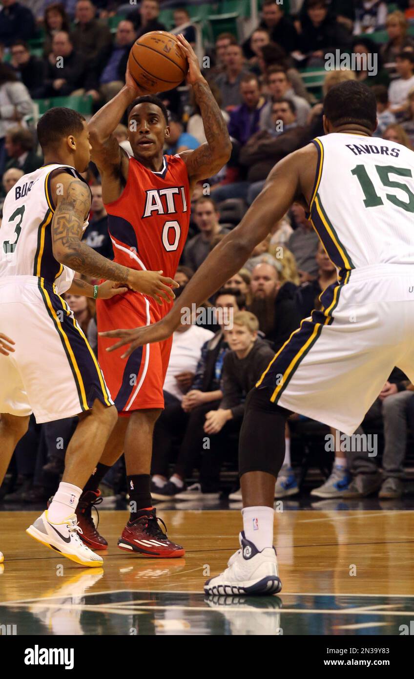 Atlanta Hawks' Jeff Teague (0) looks to pass the ball past Utah Jazz's