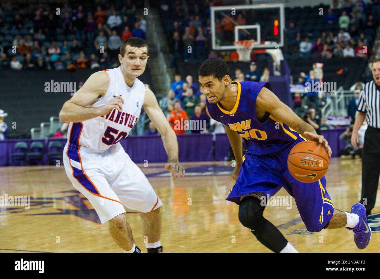 Northern Iowa’s Jeremy (20) drives around Evansville’s Blake