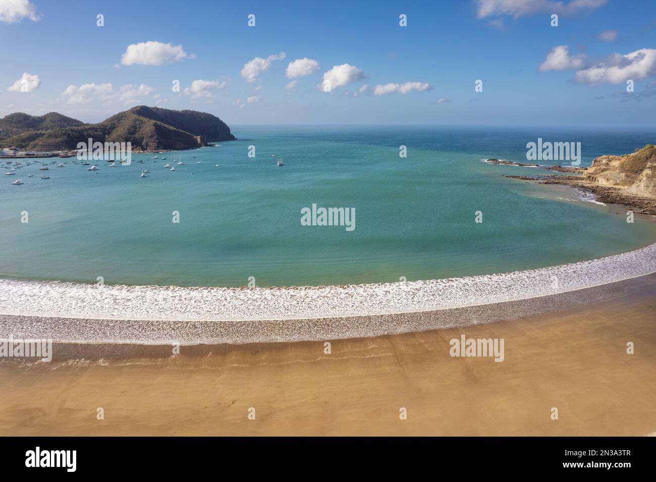 Empty exotic beach on blue water bay aerial drone view on sunrise time Stock Photo