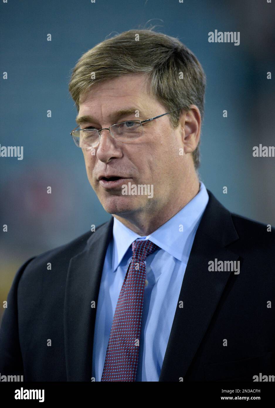 Tennessee Titans general manager Ruston Wilson stands on the field before  an NFL football game between the Seattle Seahawks and the Tennessee Titans,  Sunday, Oct. 13, 2013, in Seattle. (AP Photo/Scott Eklund