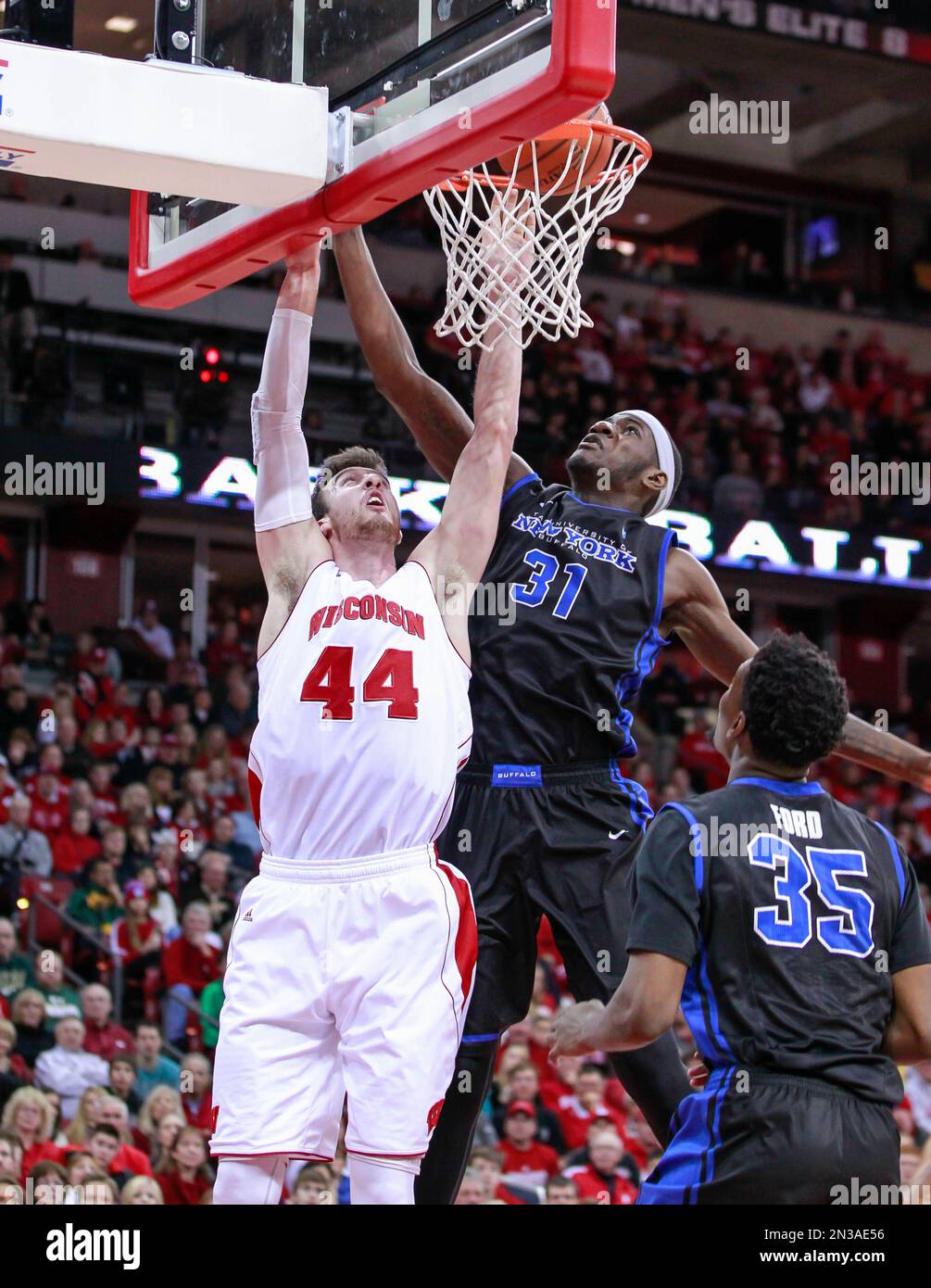 Wisconsin Forward Frank Kaminsky, Left, Against Buffalo's Raheem ...