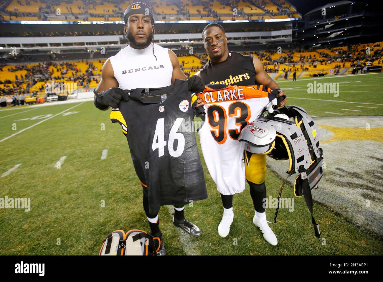 Pittsburgh Steelers Will Johnson, right, swaps jerseys with Cincinnati  Bengals defensive end Will Clarke (93) after