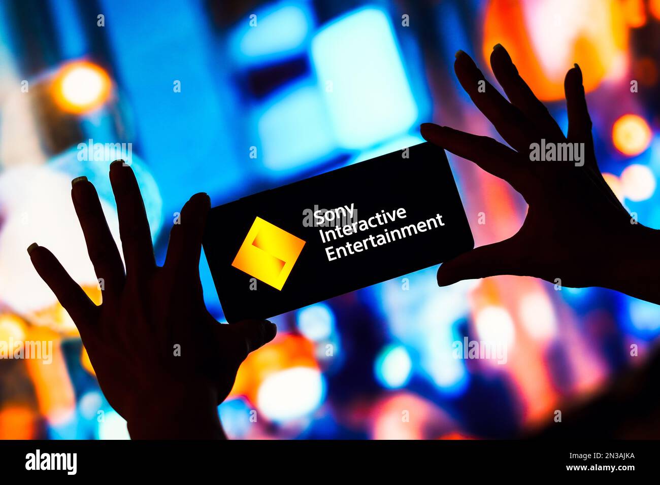 In this photo illustration, the Sony Interactive Entertainment (SIE) logo is displayed on a smartphone screen. Stock Photo