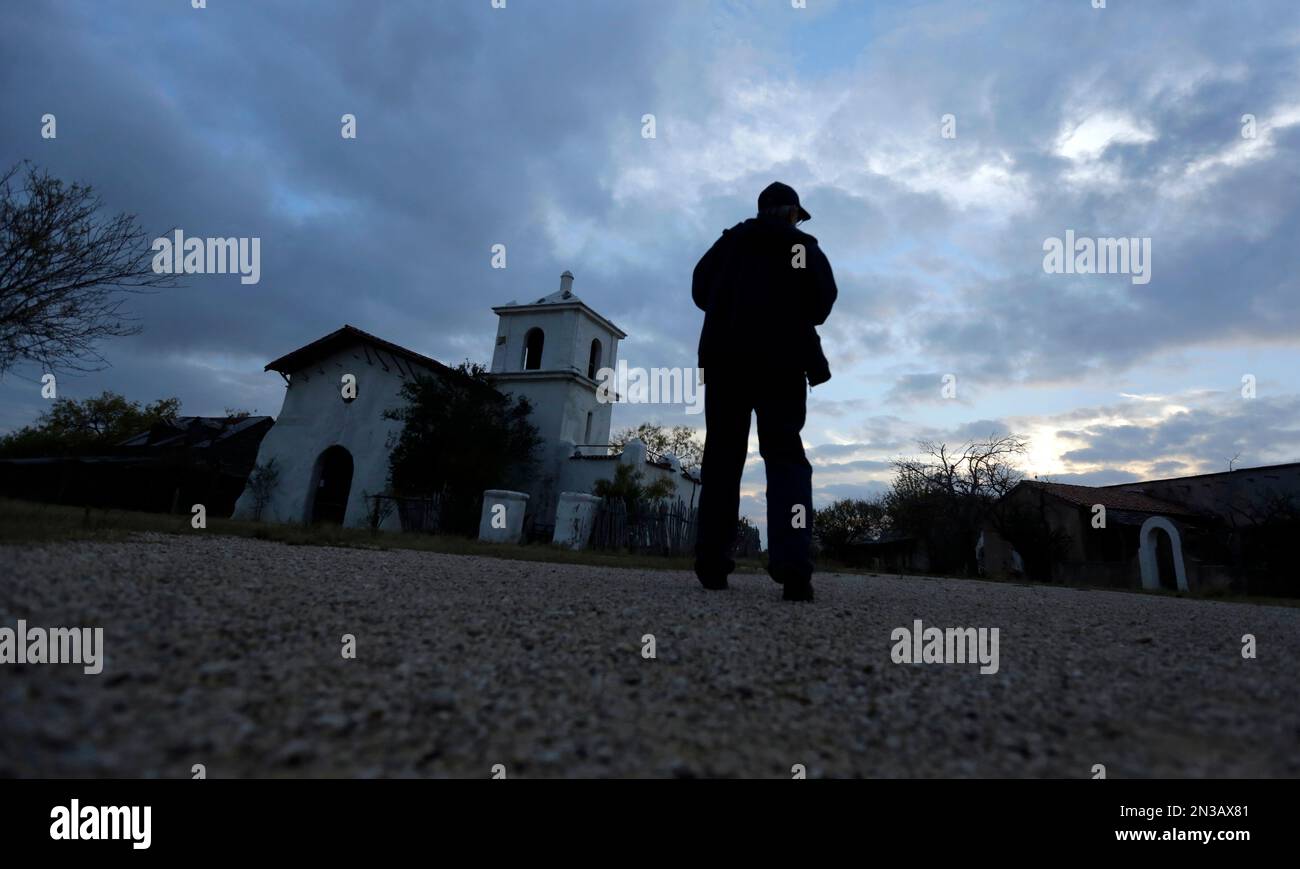 In this Dec. 4, 2014 photo, Rich Curilla walks past a replica of the