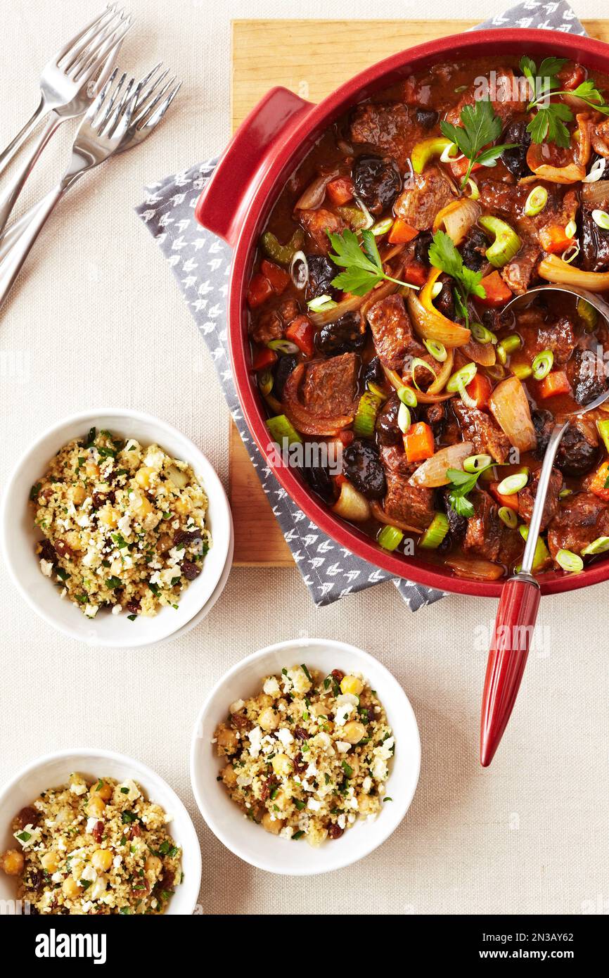 Beef Tagine stew served with bowls of couscous Stock Photo Alamy