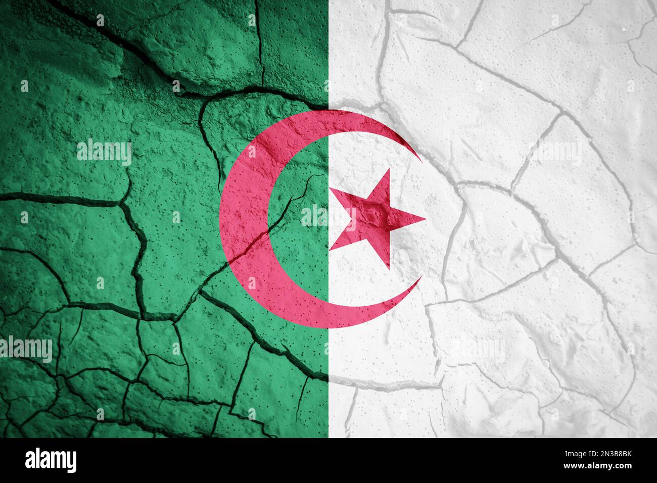 Flag of Algeria. Algeria symbol. Flag on the background of dry cracked earth. Algerian flag with drought concept Stock Photo