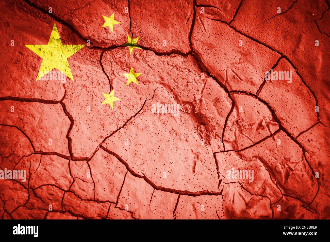 Flag of China. china symbol. Flag on the background of dry cracked