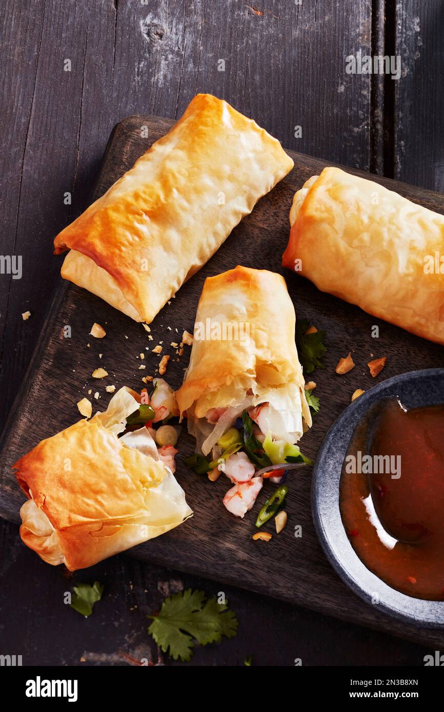 Shrimp spring rolls with dipping sauce Stock Photo