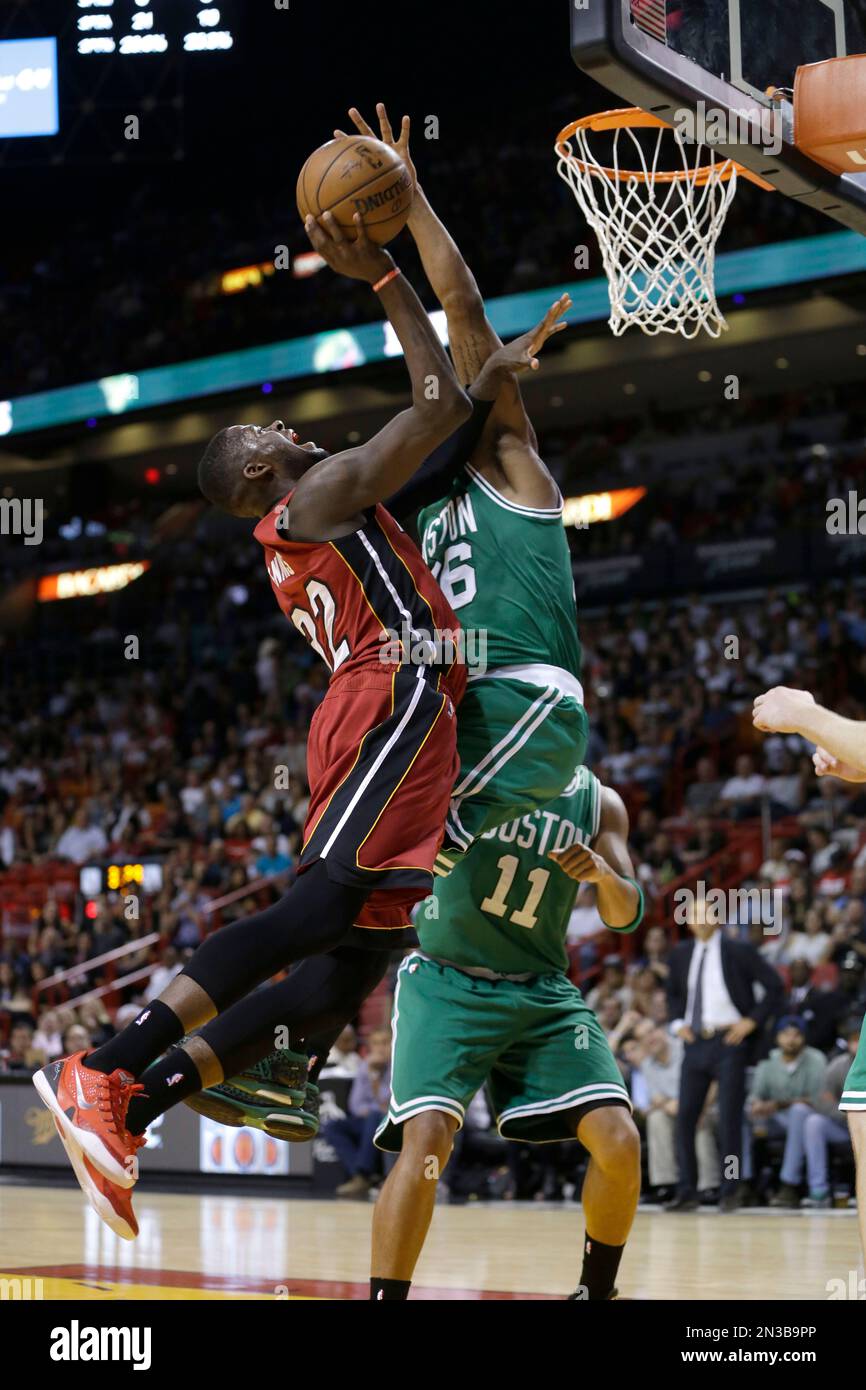 Miami Heat forward James Ennis (32) is fouled by Boston Celtics guard