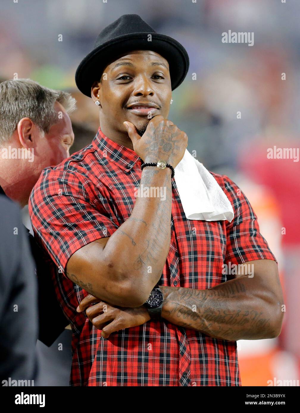 Former Arizona Cardinals player Adrian Wilson watches from the