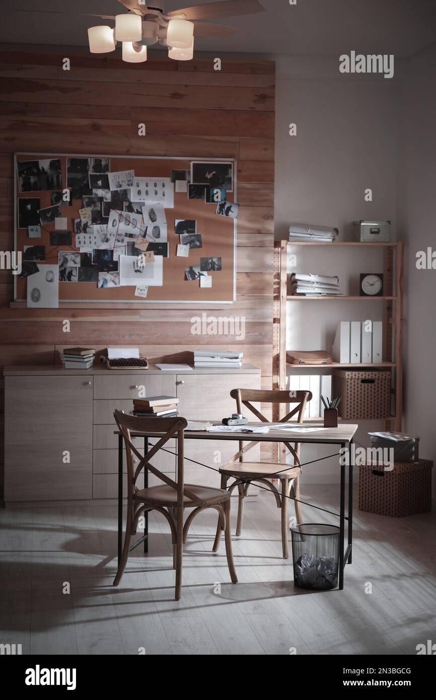 Detective office interior with evidence board on wall Stock Photo - Alamy