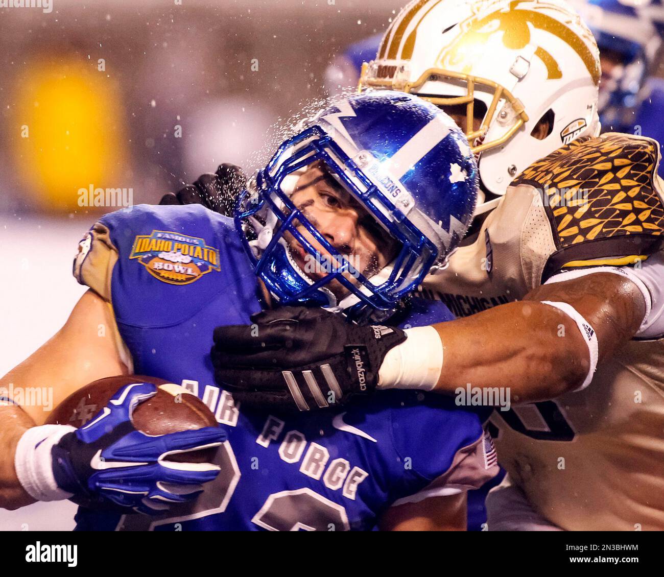 Air Force running back Paco Solano (22) is tackled by Western Michigan  linebacker Jarrell McKinney during the second half of the Famous Idaho  Potato Bowl NCAA college football game in Boise, Idaho,