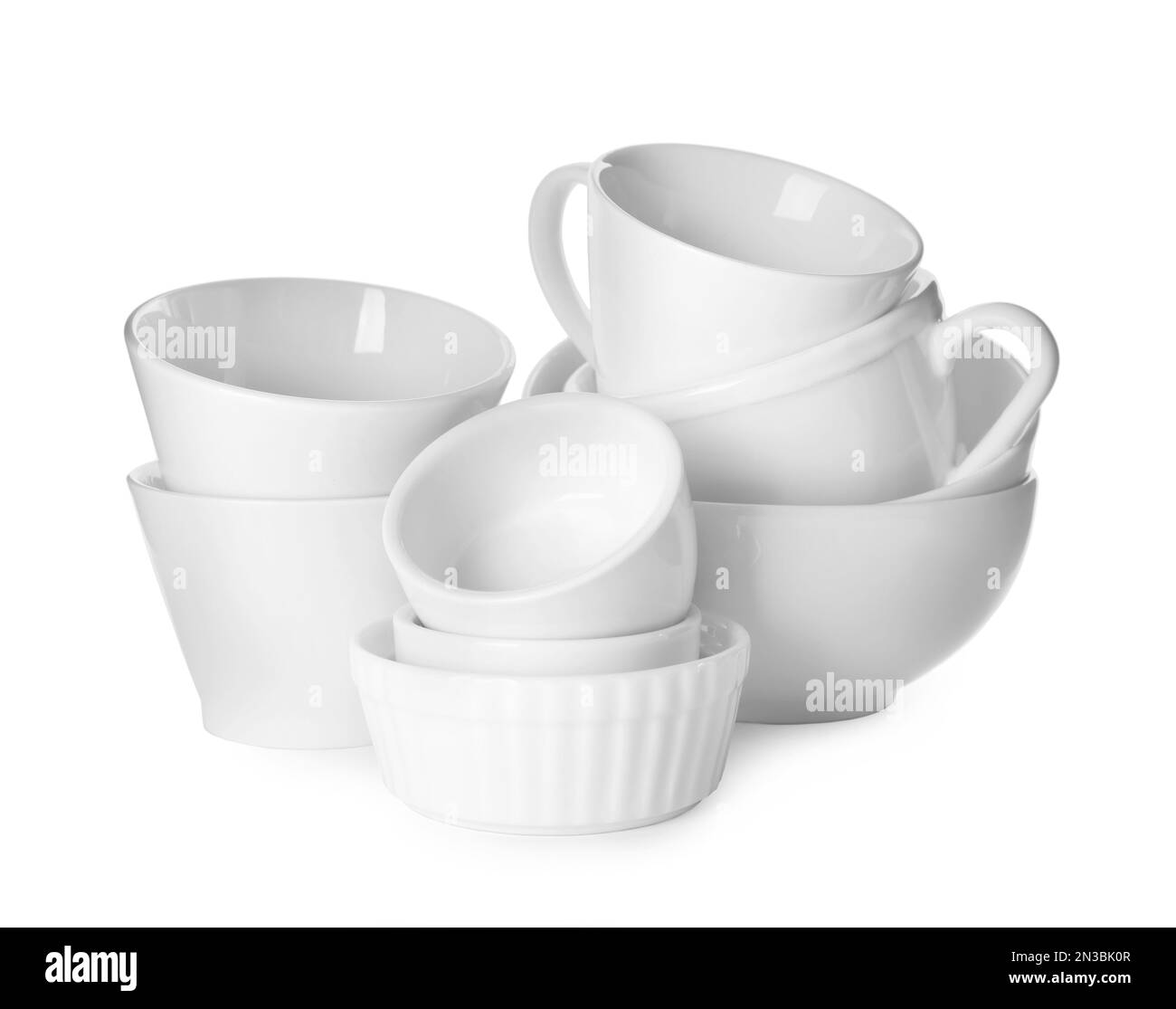 Clean bowls and cups on white background Stock Photo Alamy