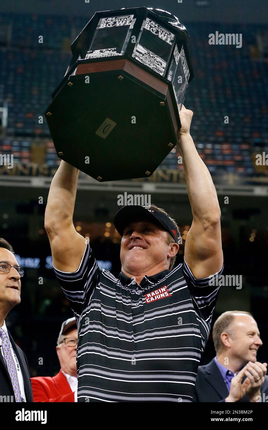 LouisianaLafayette head coach Mark Hudspeth celebrates his victory in