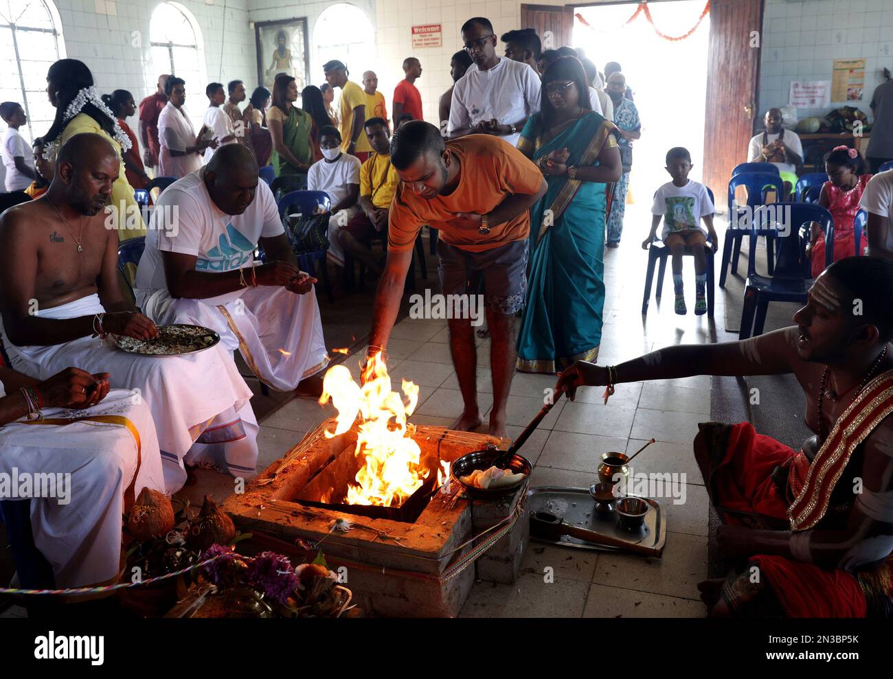 Hindu devotees praying during the annual Thaipoosam Kavady festival at ...