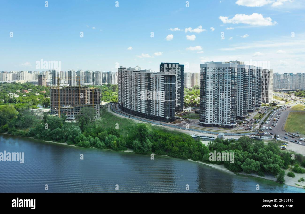 Aerial view of city district on riverside Stock Photo - Alamy