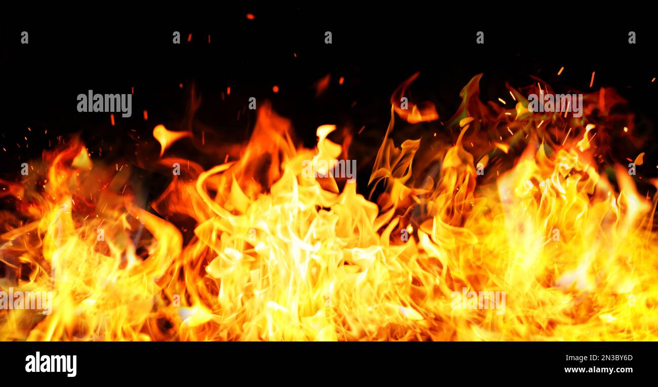 Beautiful bright fire flames on black background. Banner design Stock ...