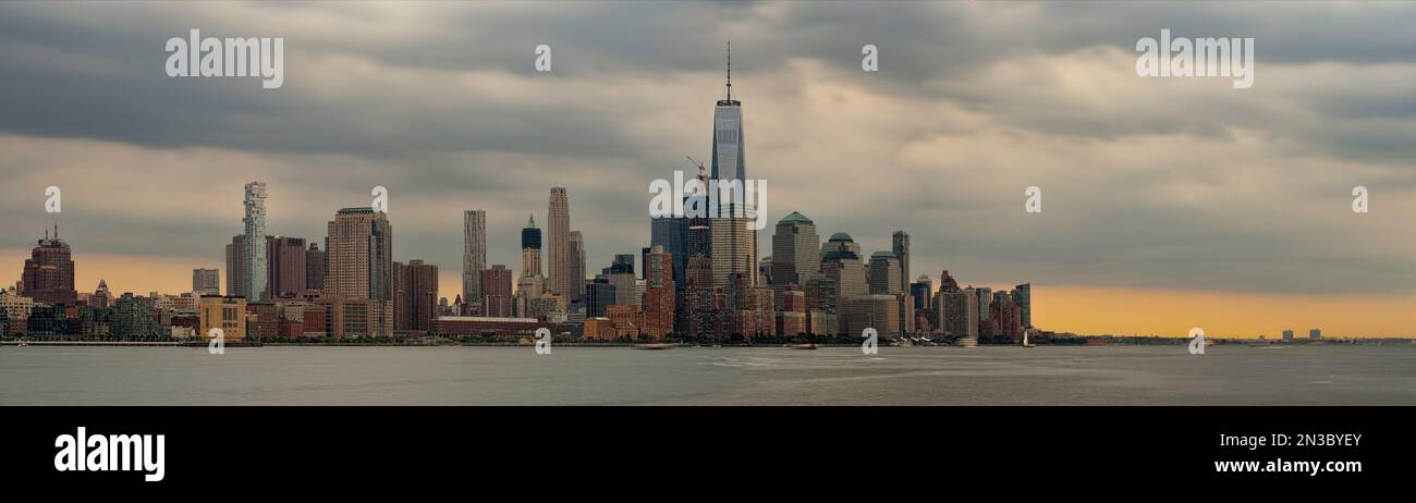 A wide photography of the downtown New York skyline in a cloudy day from Hoboken, NJ. Stock Photo