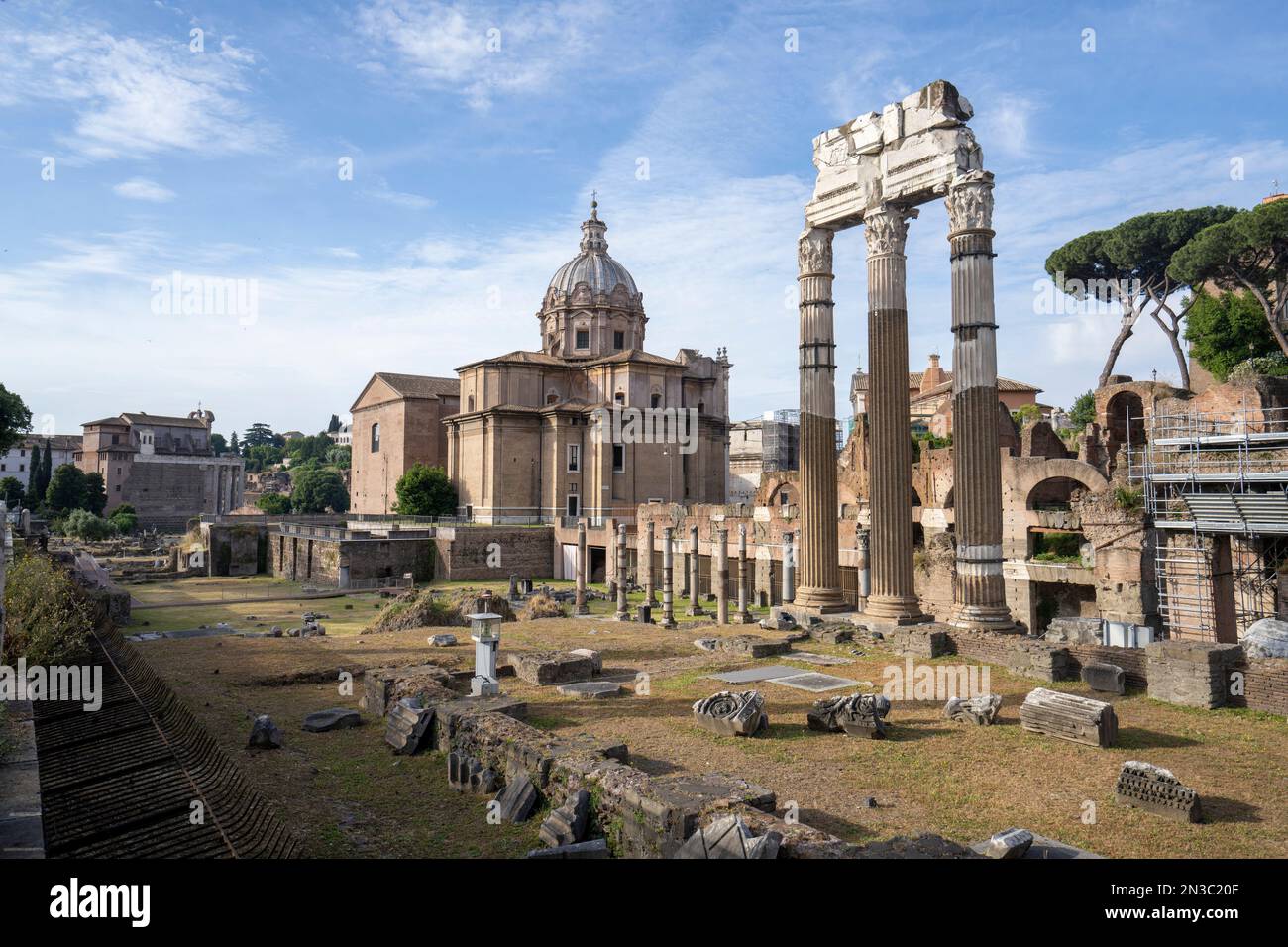 Chiesa Santi Luca E Martina, Temple of Castor and Pollux and Foro Romano ruins (Roman Forum) of Ancient Rome; Rome, Italy Stock Photo