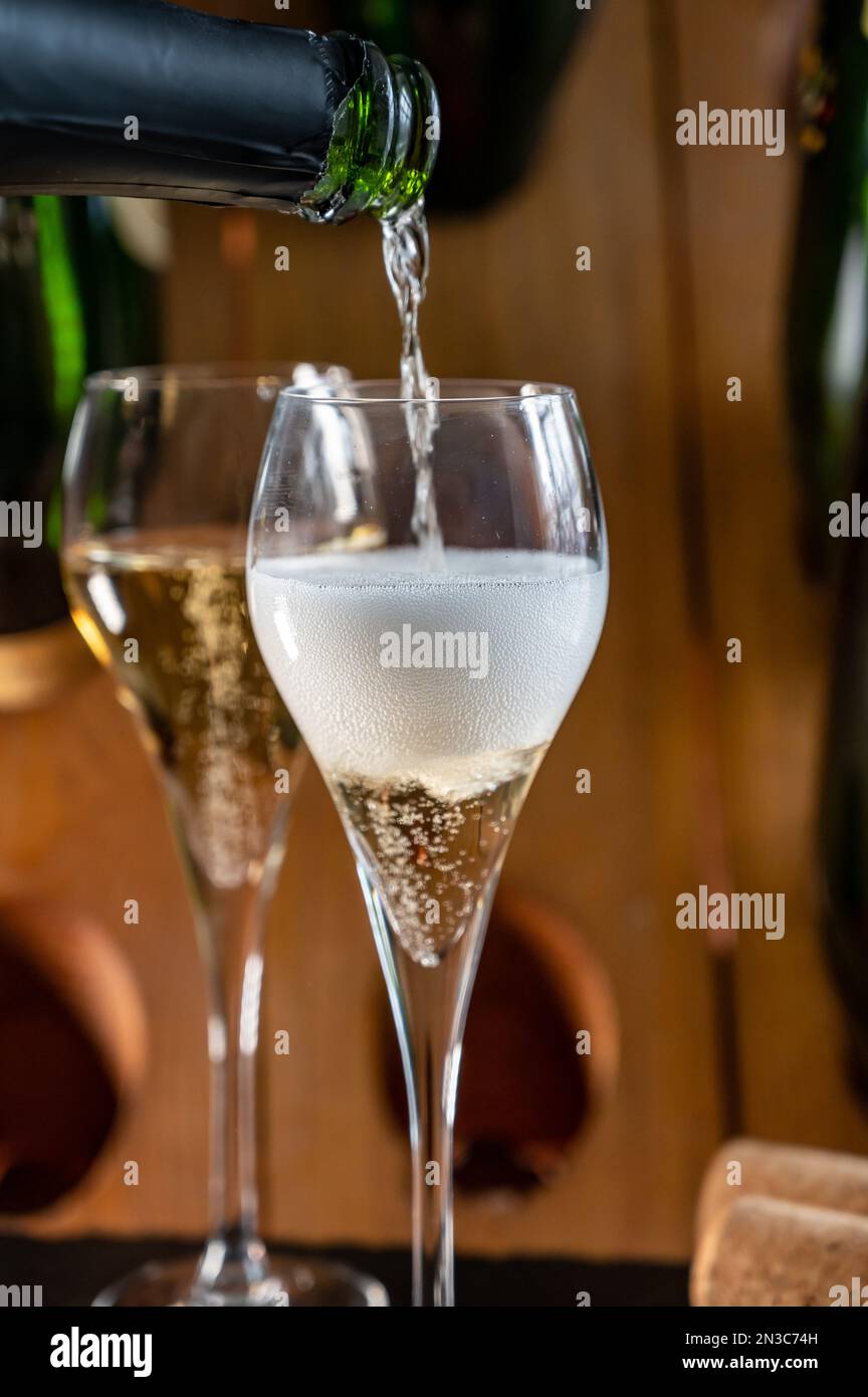 Glasses of sparkling white wine champagne gran cru or cava with bubbles