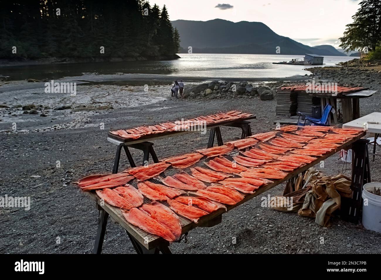 Salmon dries on racks before being smoked with alder at a Native