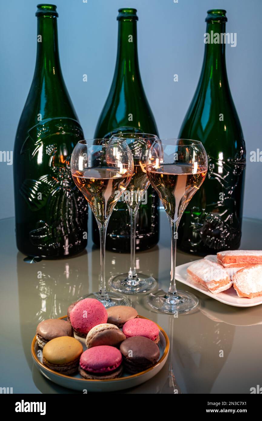 Tasting of rose brut Champagne sparkling wine in cellars of gran cru