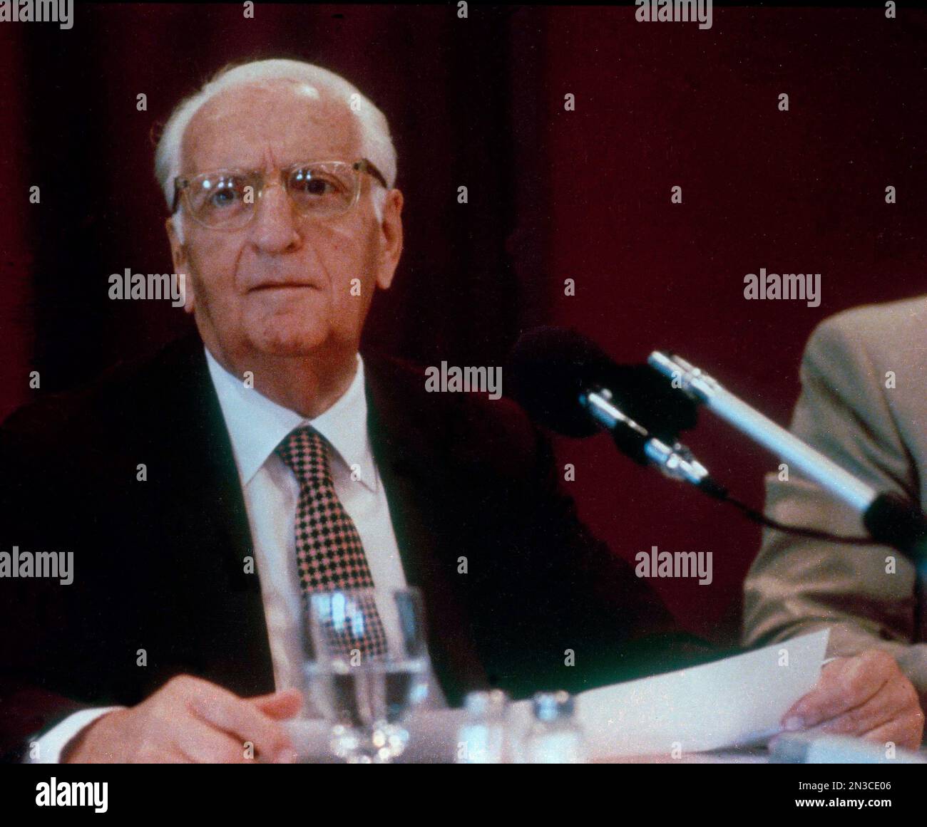 Race car driver Enzo Ferrari is pictured during a news conference in