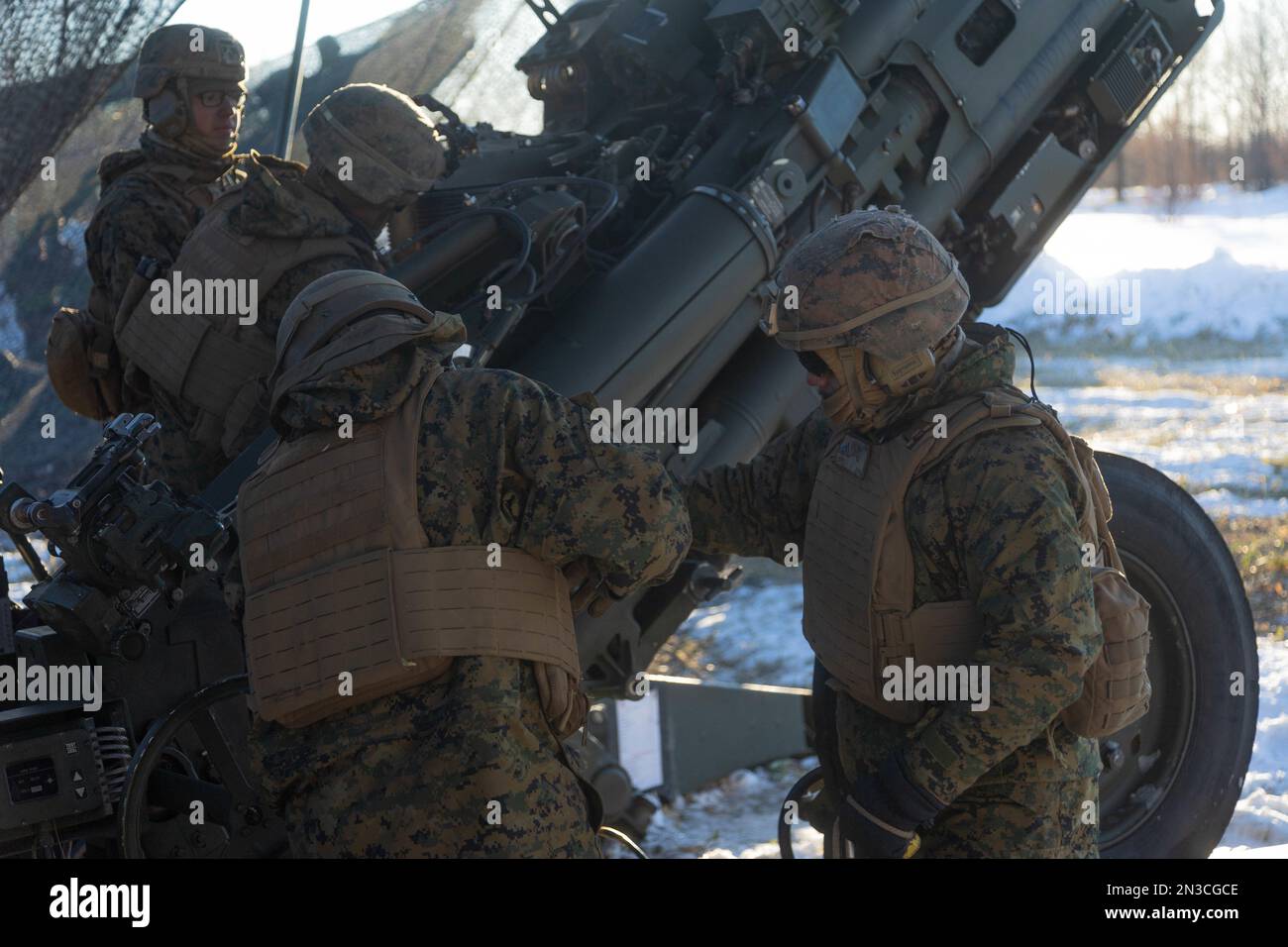 U.S. Marines with 3d Battalion, 12th Marines prepare to fire an M777 towed 155 mm howitzer during Artillery Relocation Training Program 22.4 at the Yausubetsu Maneuver Area, Hokkaido, Japan, Jan. 28, 2023. The skills developed at ARTP increase the proficiency and readiness of the only permanently forward-deployed artillery unit in the Marine Corps, enabling them to provide precision indirect fires. (U.S. Marine Corps photo by Lance Cpl. Jaylen Davis) Stock Photo