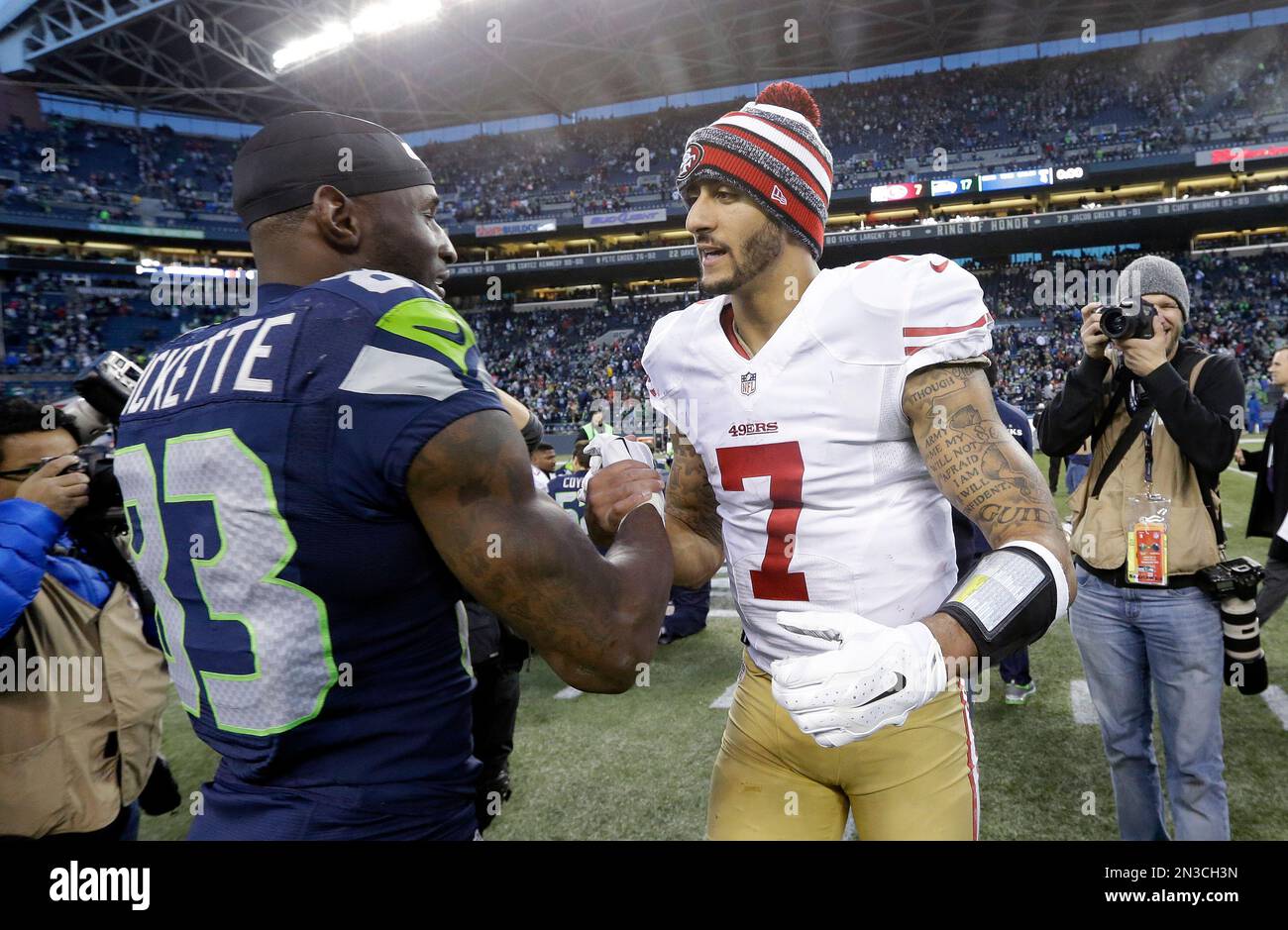 San Francisco 49ers quarterback Colin Kaepernick (7) greets Seattle ...