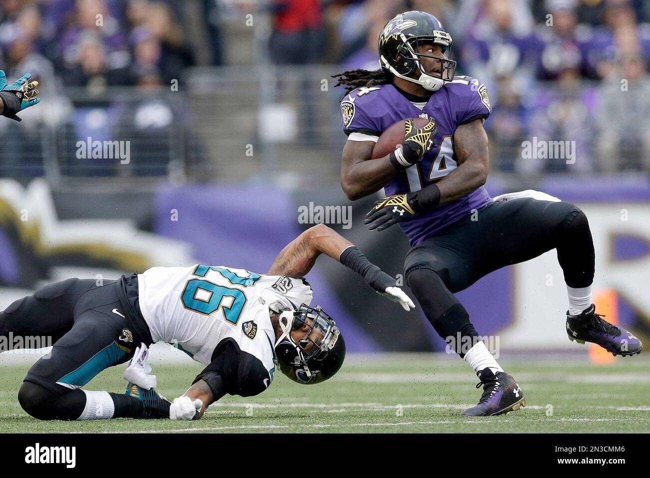 Baltimore Ravens wide receiver Marlon Brown (14) spins around