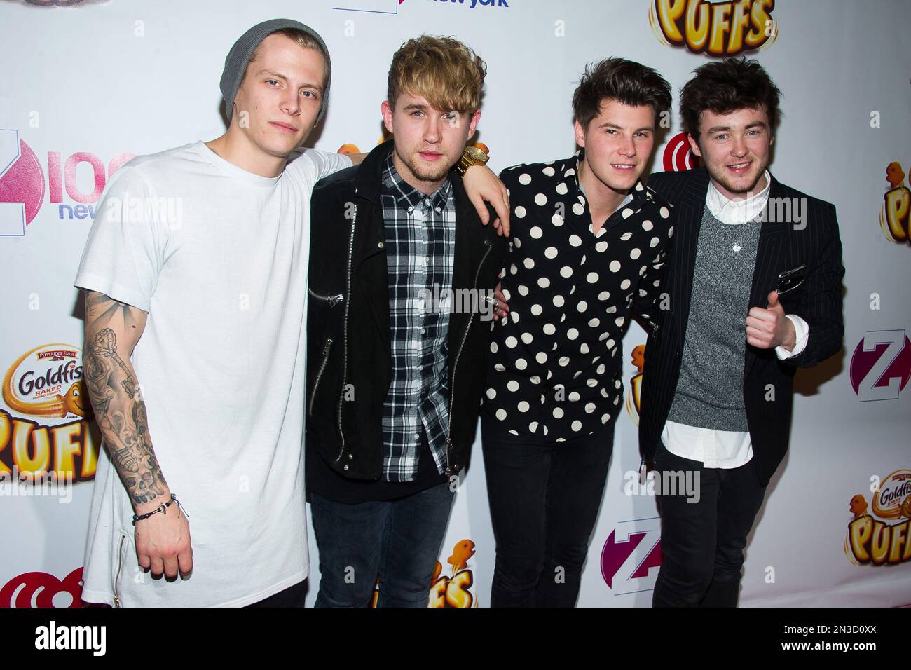 The band Rixton poses in the Z100 Jingle Ball press room at Madison ...