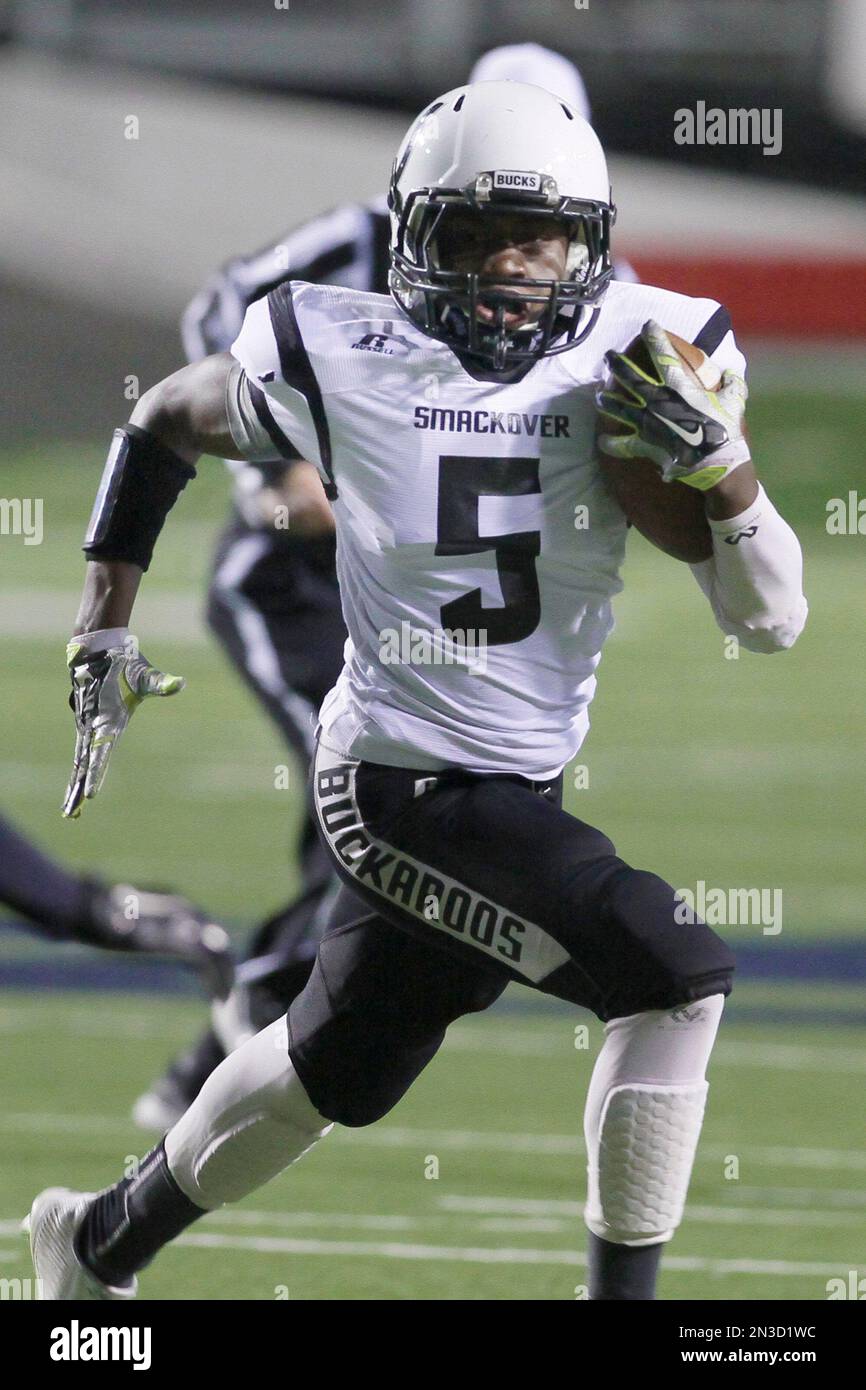 Smackover running back Dewayne Jones carries the ball in the first
