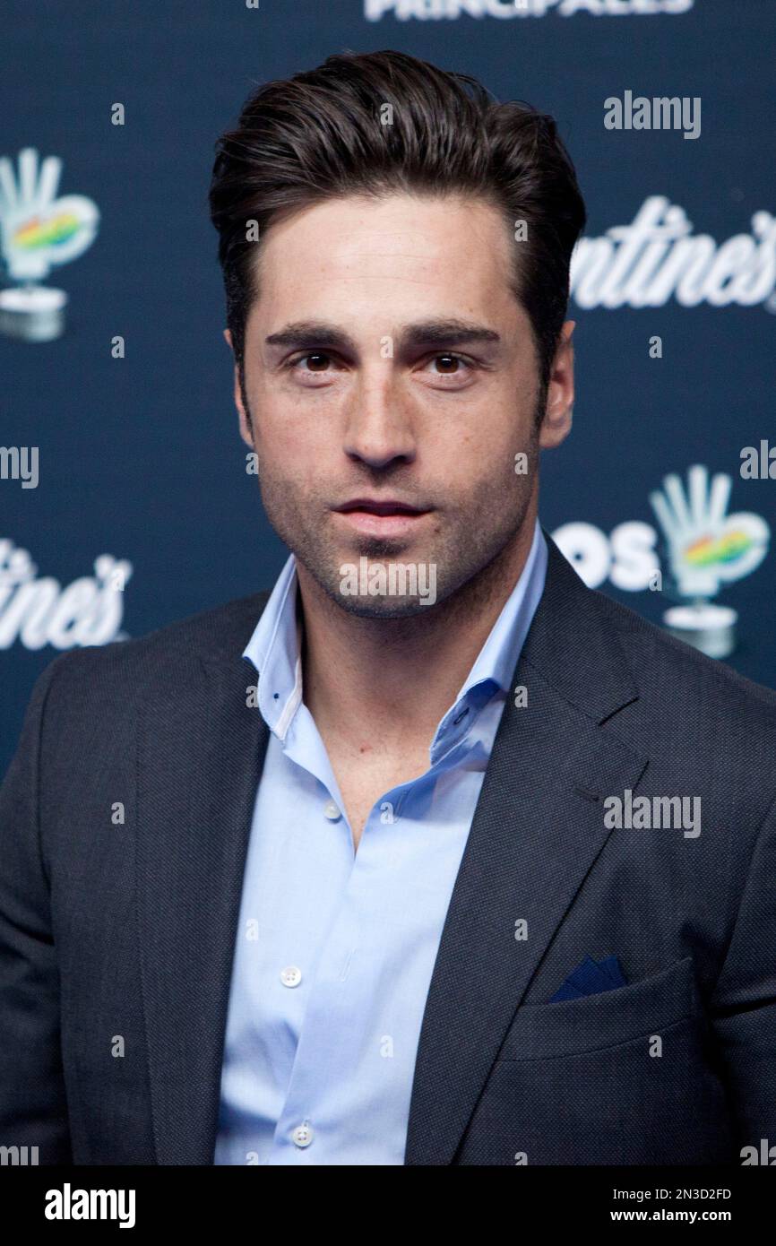 Spanish singer David Bustamante poses for photographers during a