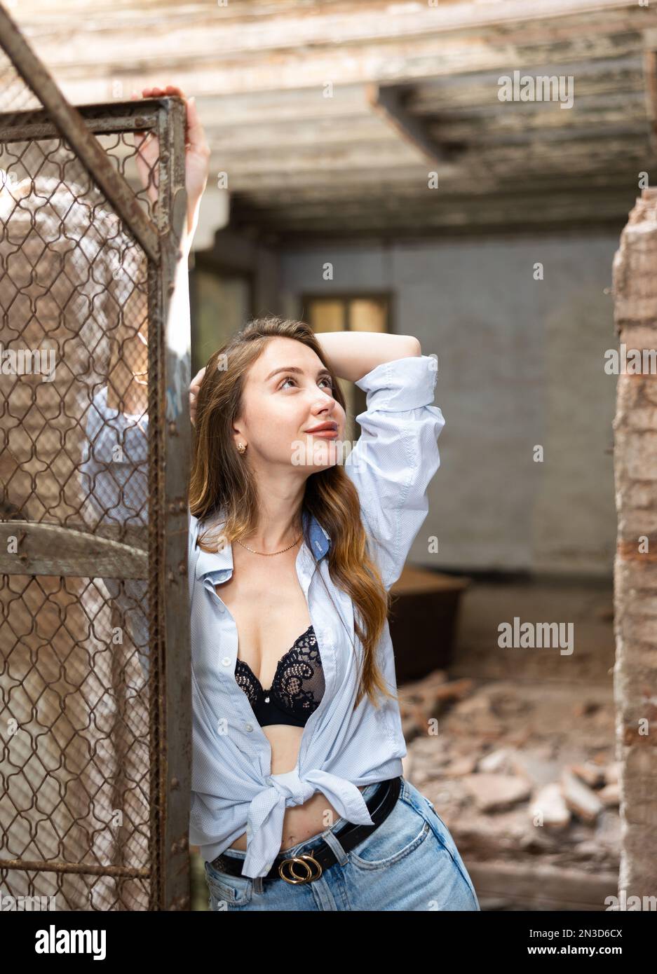 beautiful female breasts in a blue bra Stock Photo - Alamy