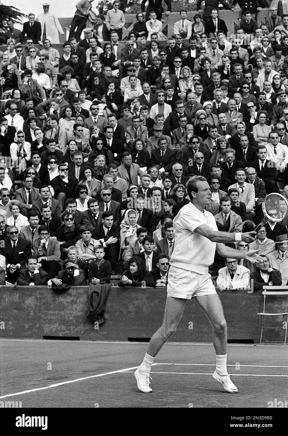 Tennis player Fred Stolle defeated Tony Roche and won the final of the  men's singles of the French tournament at Roland Garros stadium in Paris,  May 29, 1965. Both men are Australian.