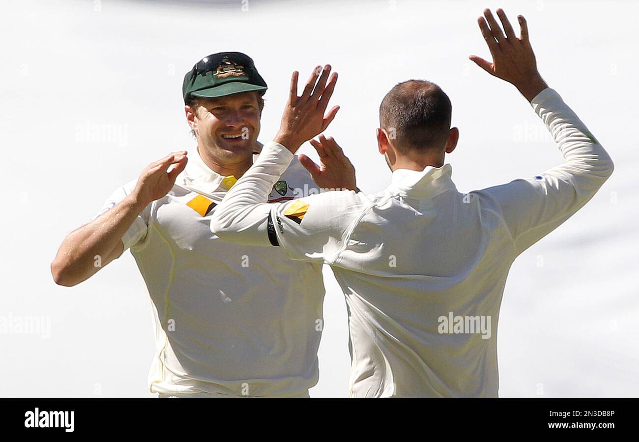 Australia's Shane Watson, left, and Nathan Lyon celebrate after they ...