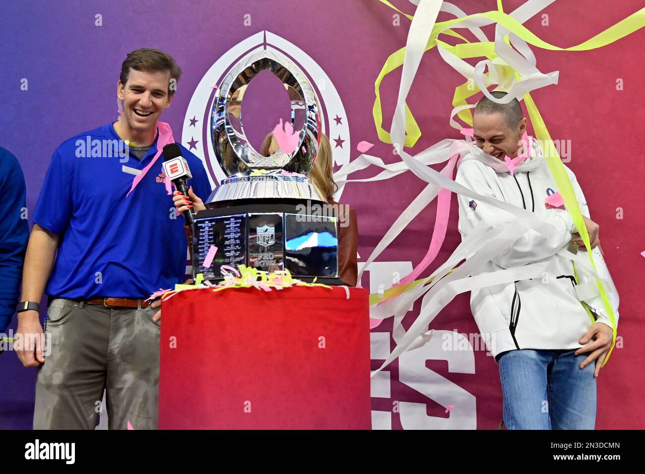 NFC captain Pete Davidson, right, reacts as he stands next to head