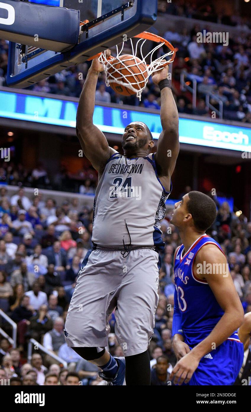 Georgetown center Joshua Smith, center, dunks against Lipscomb