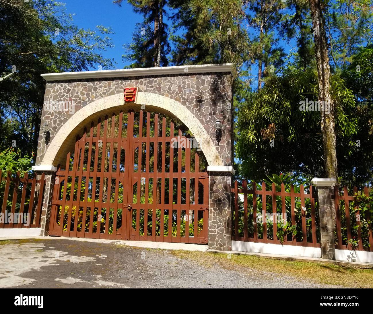 farm gate of carmelite and brown color, with stones in the vordes Stock ...