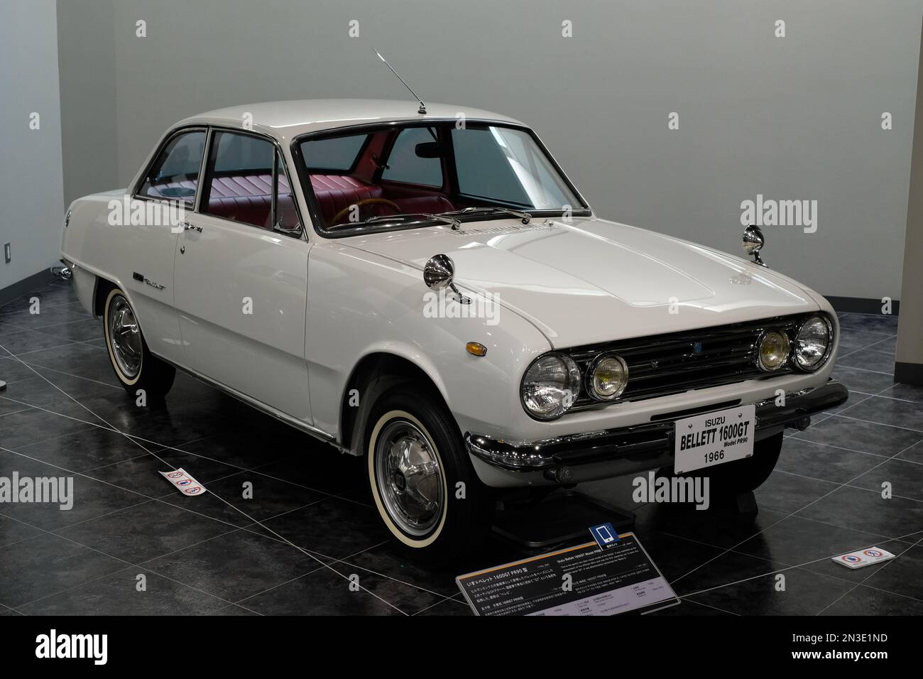 A beautiful view of a white classic vintage car collected in the Toyota