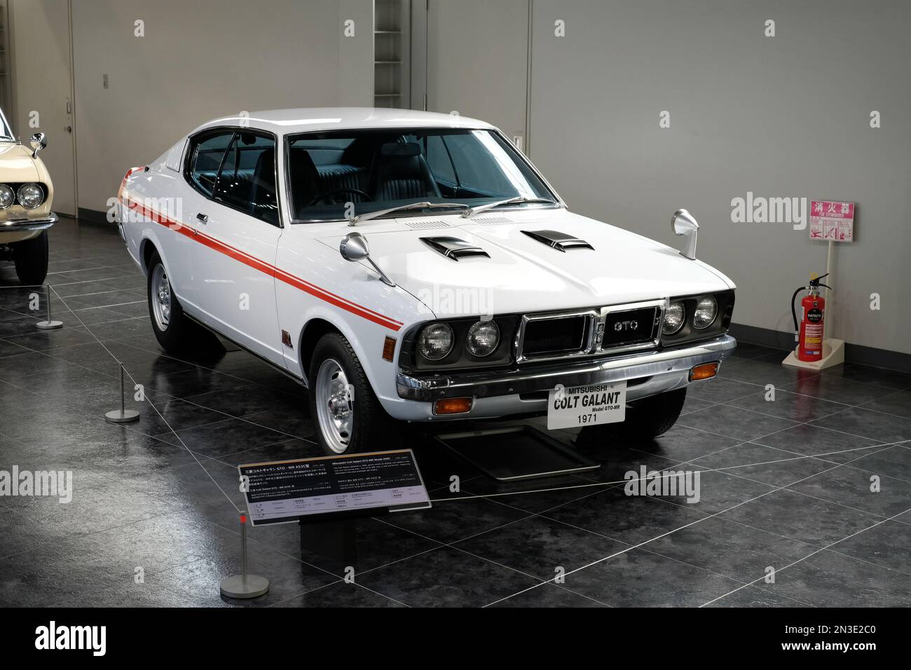 A beautiful view of a white classic vintage car collected in the Toyota