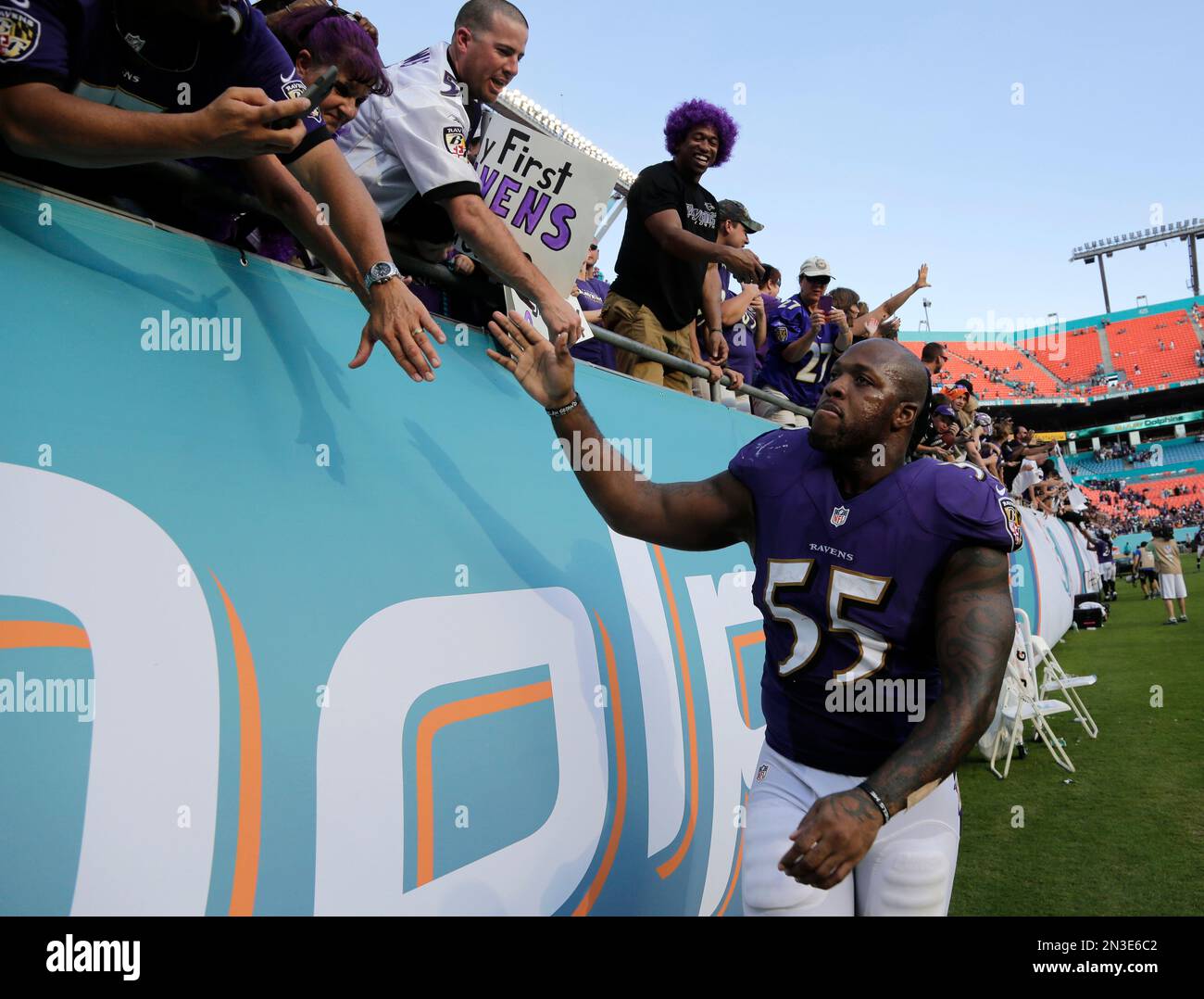 Baltimore Ravens linebacker Terrell Suggs (55) walks the sidleines