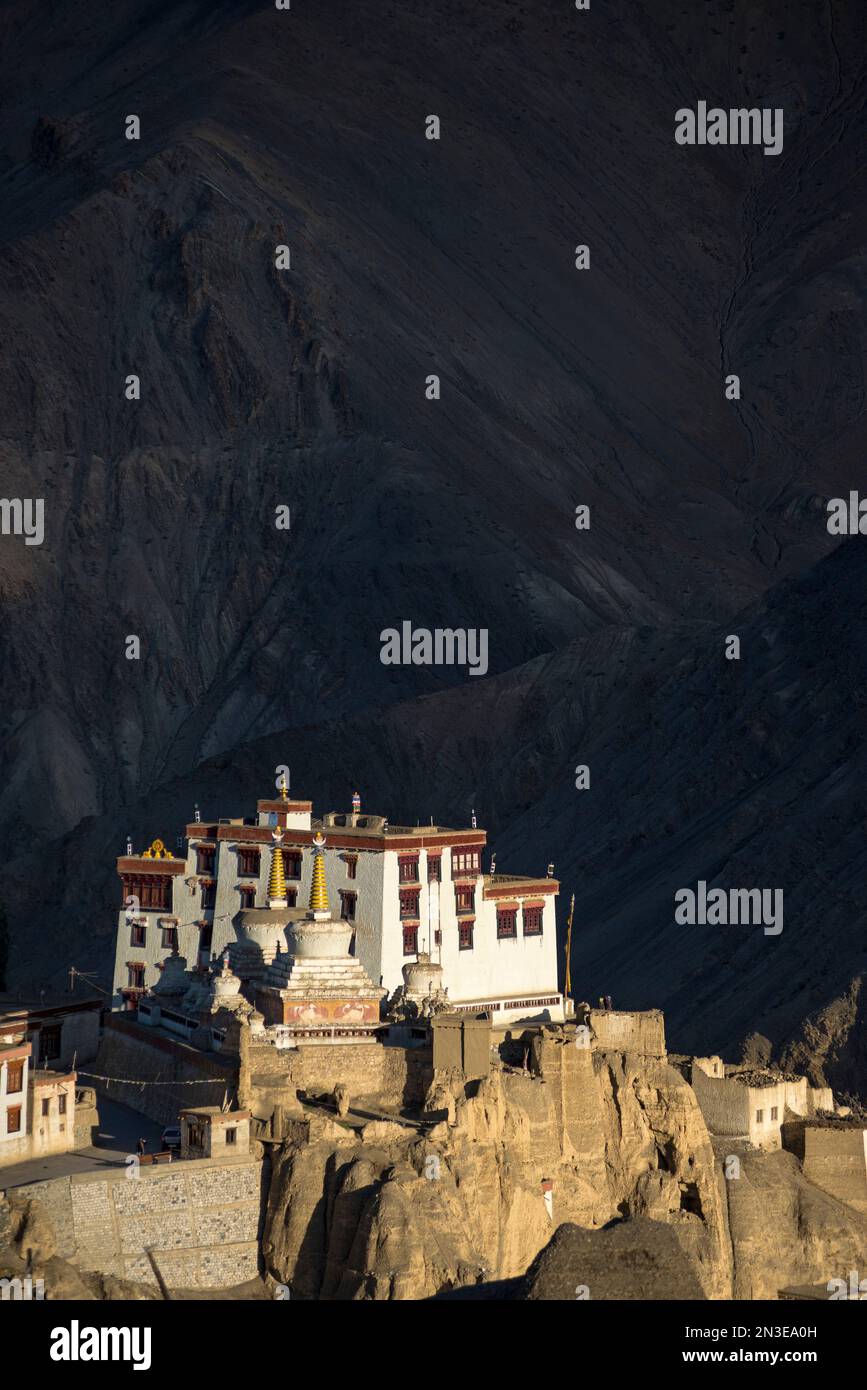 View of the Tibetan Buddhist Lamayuru Monastery on a clifftop at sunset in Lamayouro of the Leh District in the Ladakh Region Stock Photo