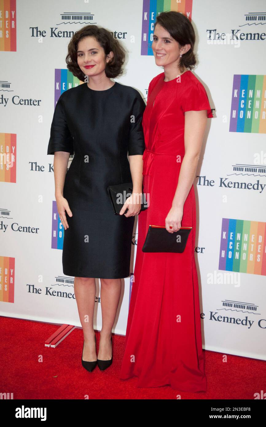 Rose Kennedy Schlossberg, left, and Tatiana Schlossberg pose for photos