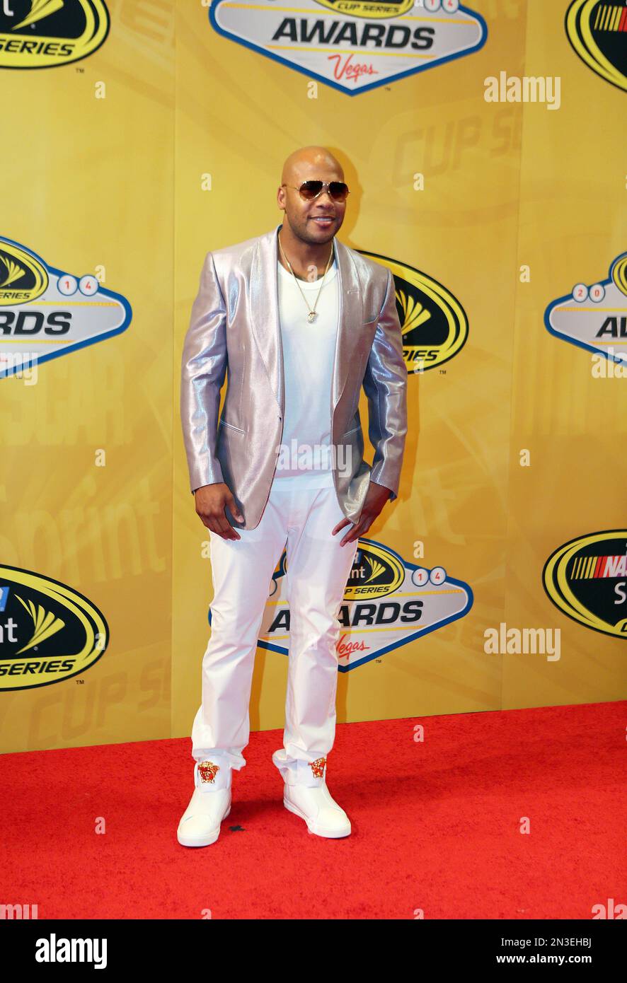 Hip-hop artist Flo Rida stands on the red carpet prior to the NASCAR ...
